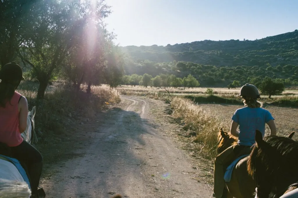 pair Two riders on the dirt track through the hills near Melandra