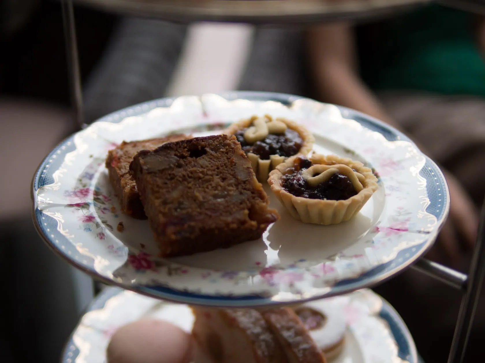 pair Fruit cake slices and mince tarts on floral china at Carcosa Seri Negara